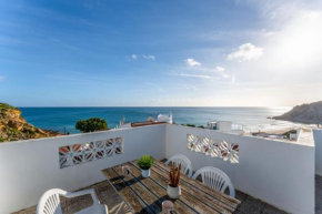 Comfy Flat W/ Rooftop Beach View by LovelyStay